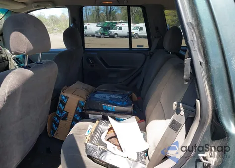 2000 Jeep Grand Cherokee Laredo z USA, uszkodzony, nr VIN 1J4GW48S7YC211727